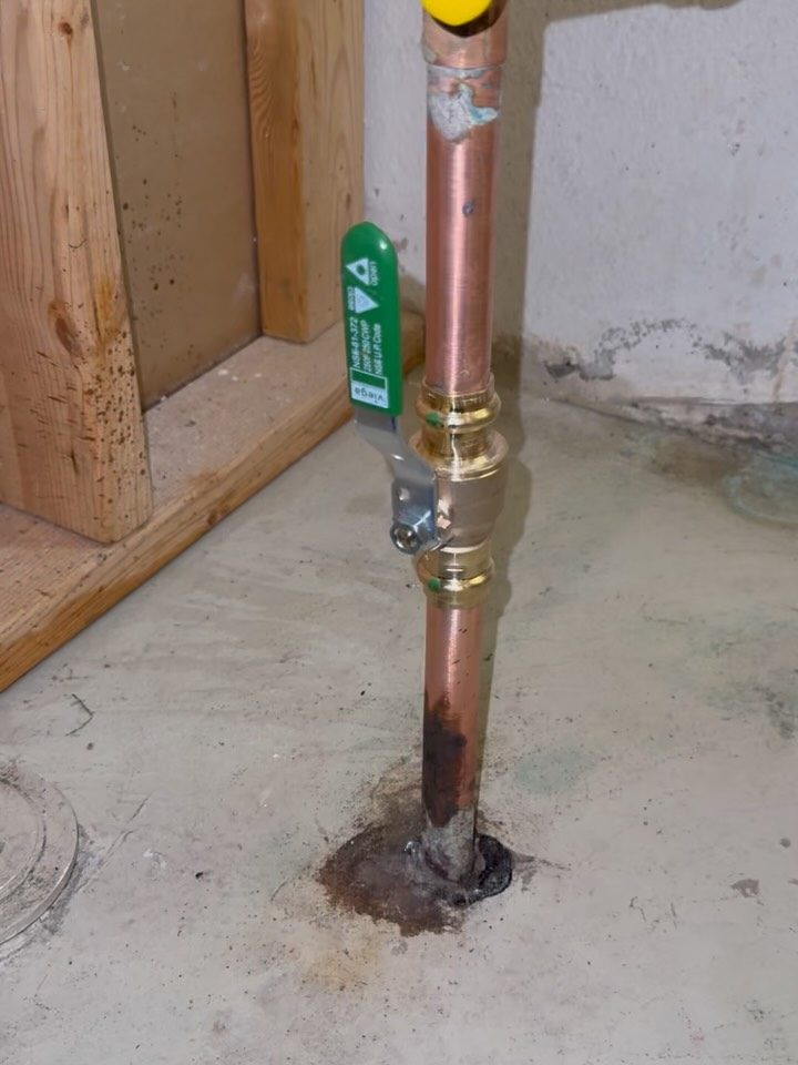 After: new copper and a 3/4-inch ball valve on the water service, shot from the same spot