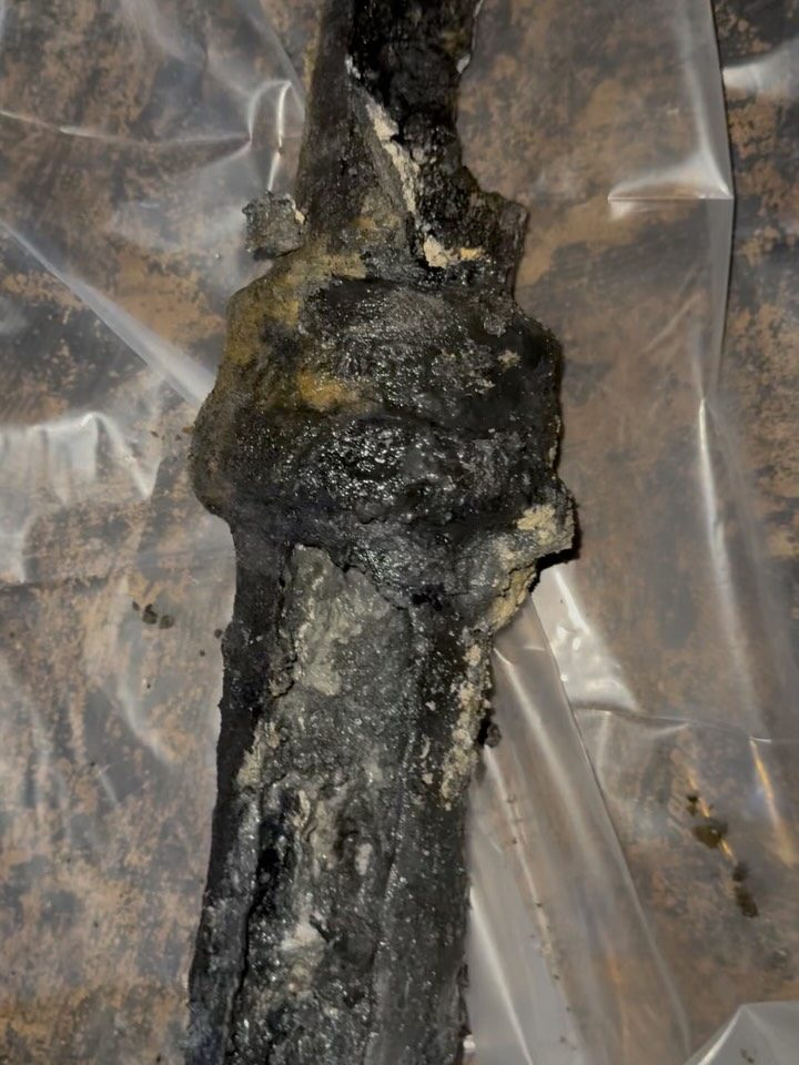 Before: the rotted, grease-choked kitchen drain pipe that came out of the floor